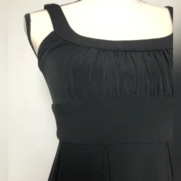 green emerald velvet dress Regency Inspired Shirred Bodice Empire Waist Mini Dress in Black main image 1